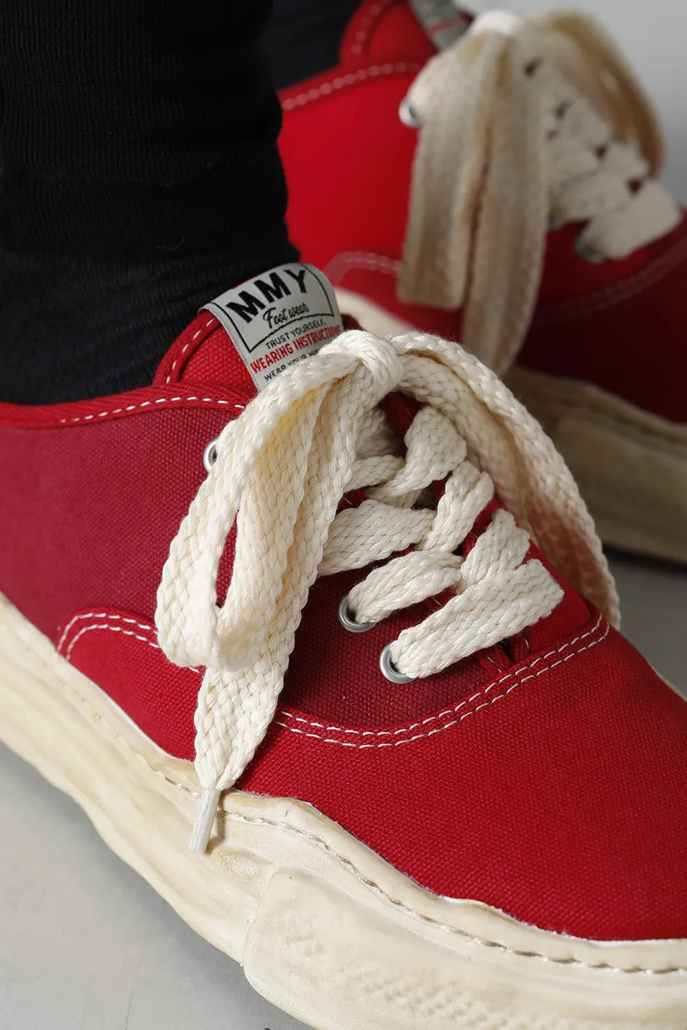 -BAKER- Over-dyed original sole canvas Low-Top sneakers Red